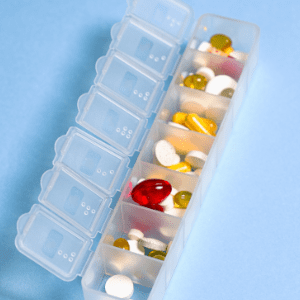 A Medicine Container With Seven Bins